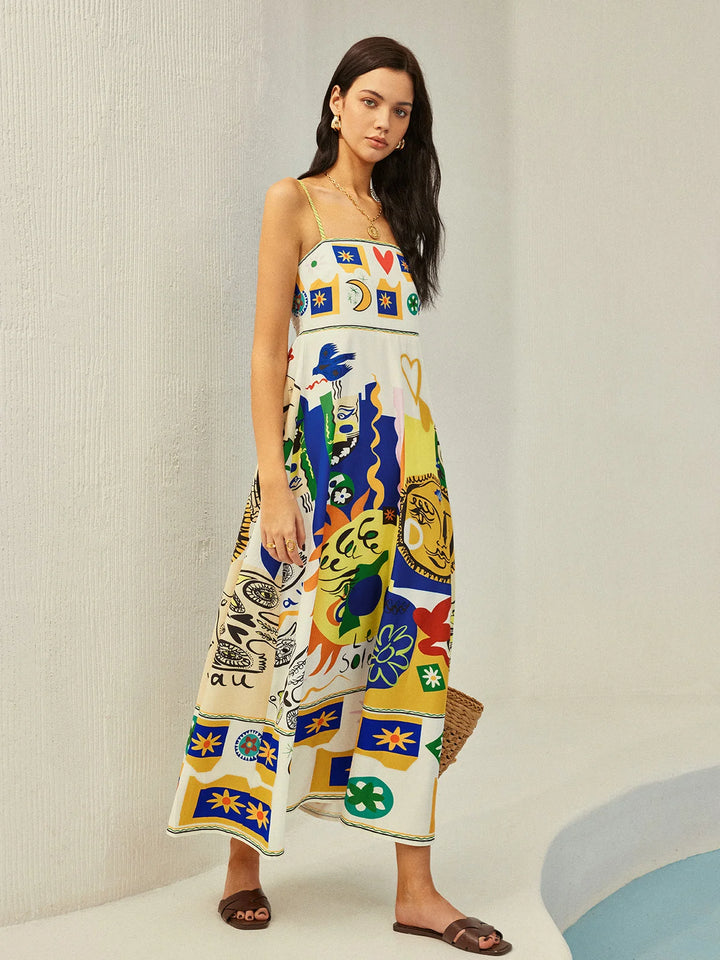 Colorful midi dress with playful prints and cami straps, perfect for a sunny day out. Made of breathable and comfortable…