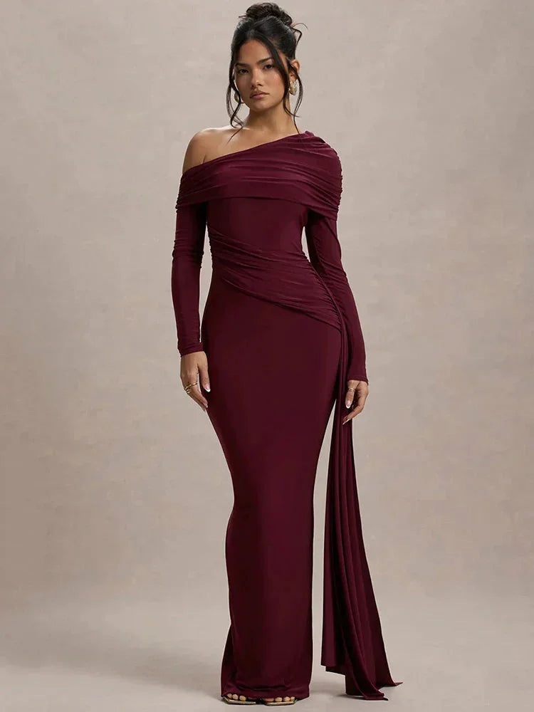 Off-shoulder draped top in saffron color. Ultra-soft fabric with an elegant design, perfect for a chic look.