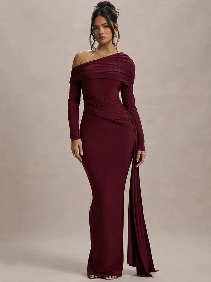 Off-shoulder draped top in saffron color. Ultra-soft fabric with an elegant design, perfect for a chic look.