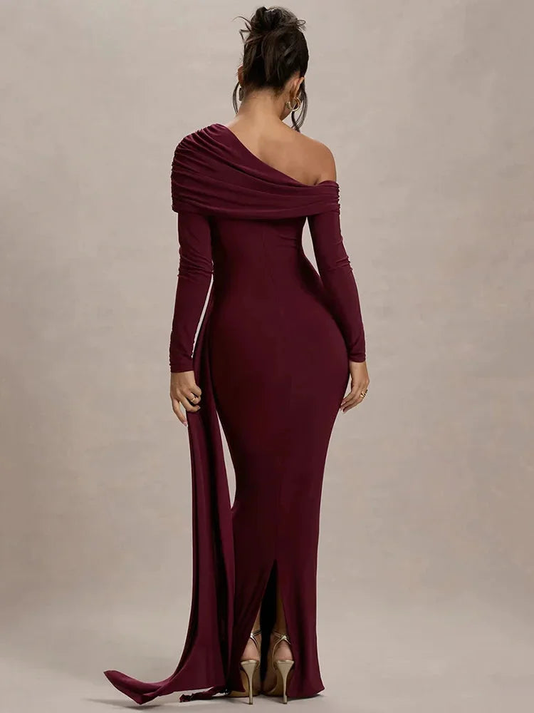 Saffron off-shoulder top with draped design in a soft, flowing fabric.
