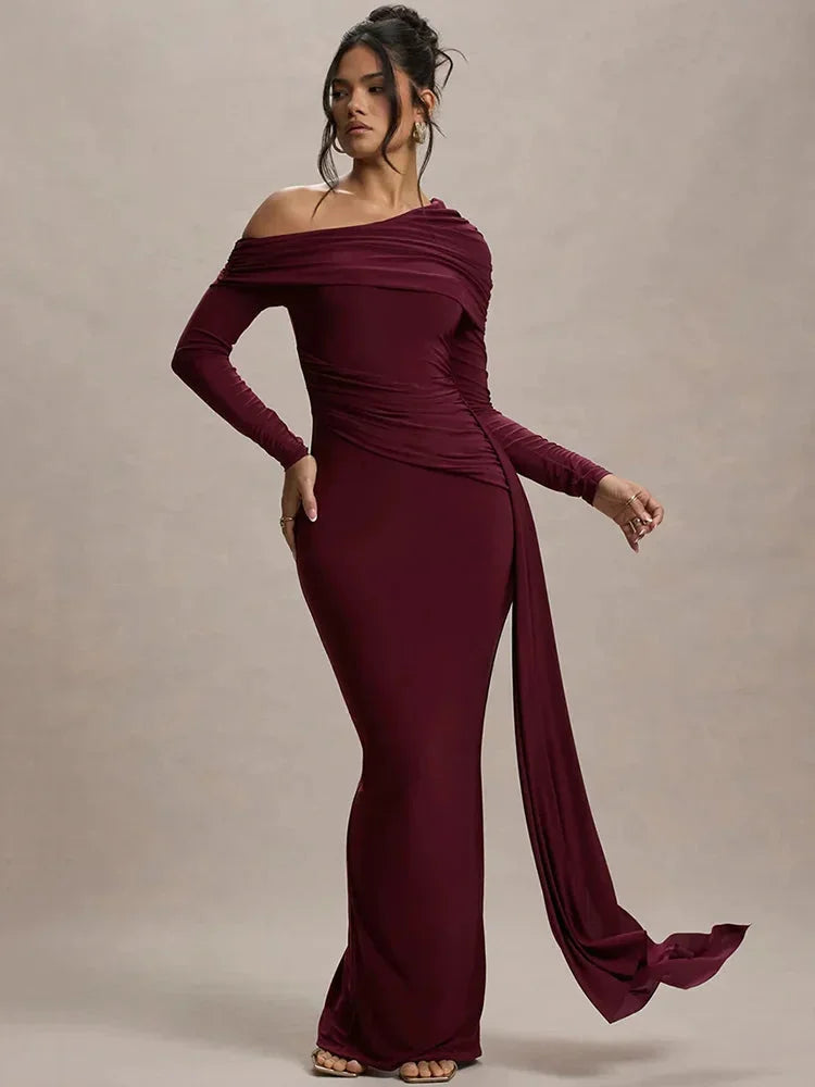 Off-shoulder draped Saffron top in rich velvet fabric with elegant detailing, highlighting a sophisticated and chic style.