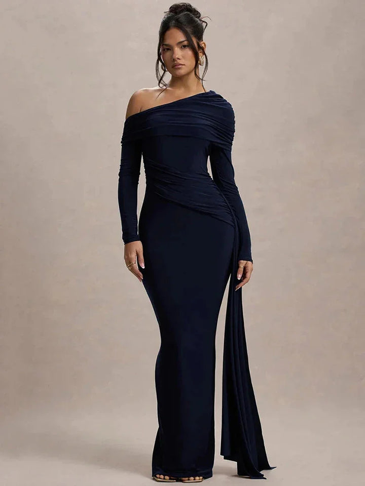 Off-shoulder draped Saffron dress with an elegant design, showcasing a rich saffron hue and intricate detailing.