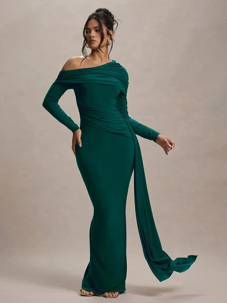 Green off-shoulder draped top with unique saffron detailing, perfect for an elegant look.