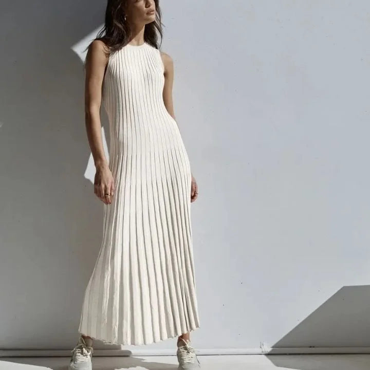 "Sleeveless pleated maxi dress for women in breezy cotton, perfect for summer days or evening events."