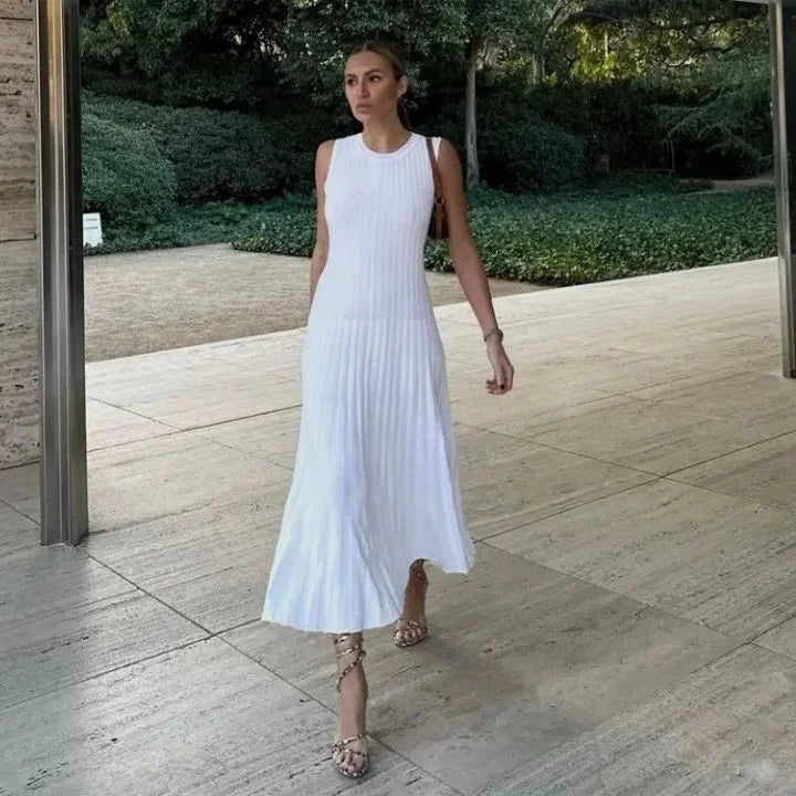 Light Beige sleeveless pleated maxi dress for women in a flowing design, perfect for casual elegance.