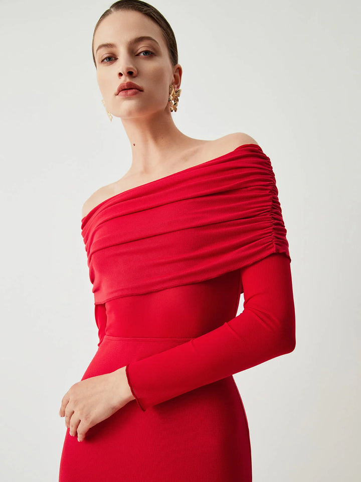 Off-shoulder mesh sleeve fitted dress in black with a sleek and modern design, perfect for a stylish evening outfit.