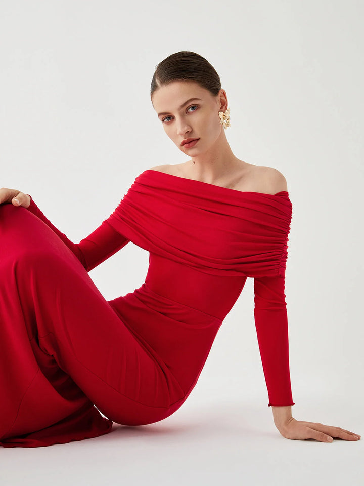 Off-shoulder mesh sleeve fitted dress in Sariya fabric, with elegant bohemian design and flattering silhouette.