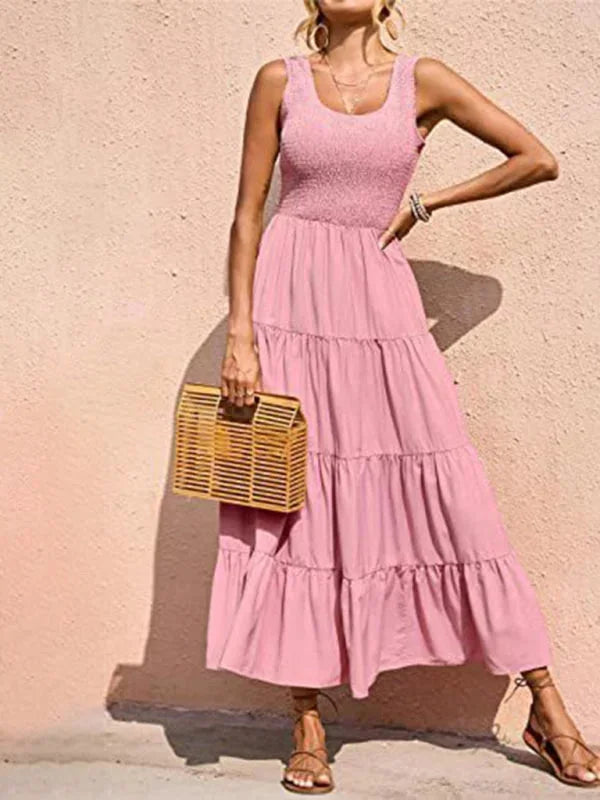 Pink smocked bodice maxi dress featuring a sleeveless design, made from soft & lightweight fabric. Perfect for a stylish and…