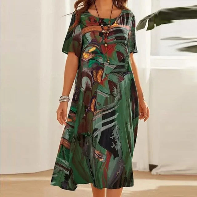 "Green knee-length modesty dress with loose fit and lightweight fabric for a comfortable and sophisticated look"