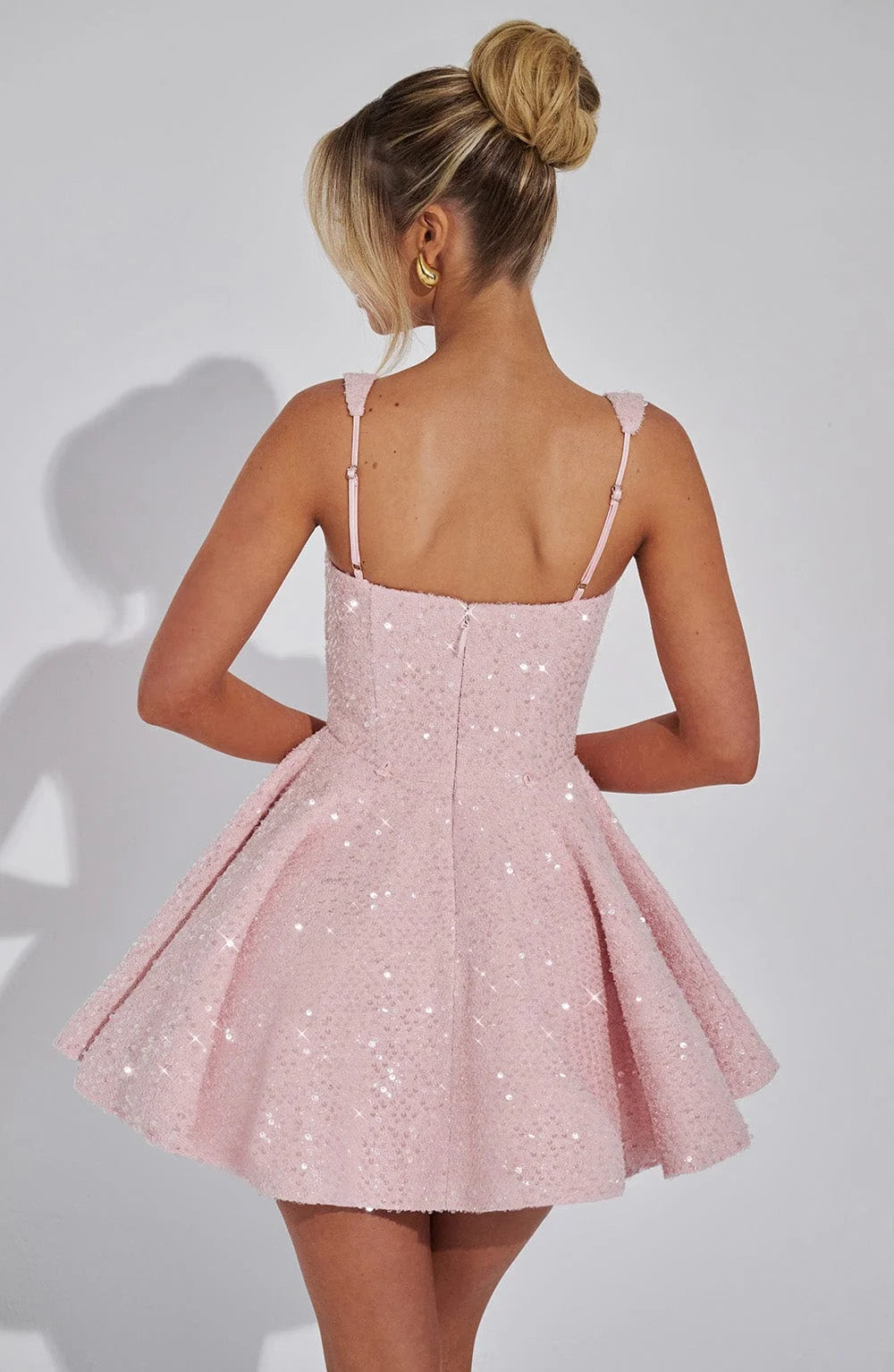 "Shania fit and flare mini dress with sparkling metallic detailing, perfect for an elegant evening out."