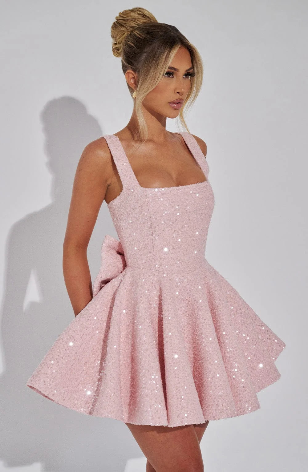"Shania dress: Stunning fit and flare mini with sparkling sequins, perfect for a night out or special event."