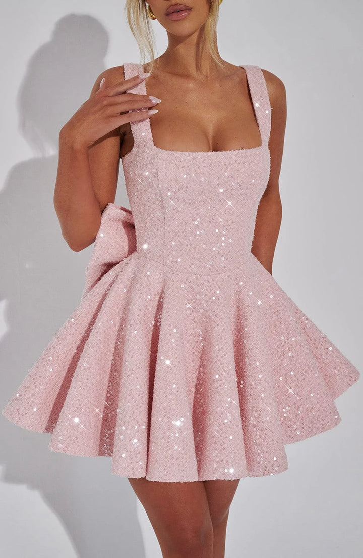 Shania fit and flare mini dress in sparkling fabric with V-neck and spaghetti straps in silver color.