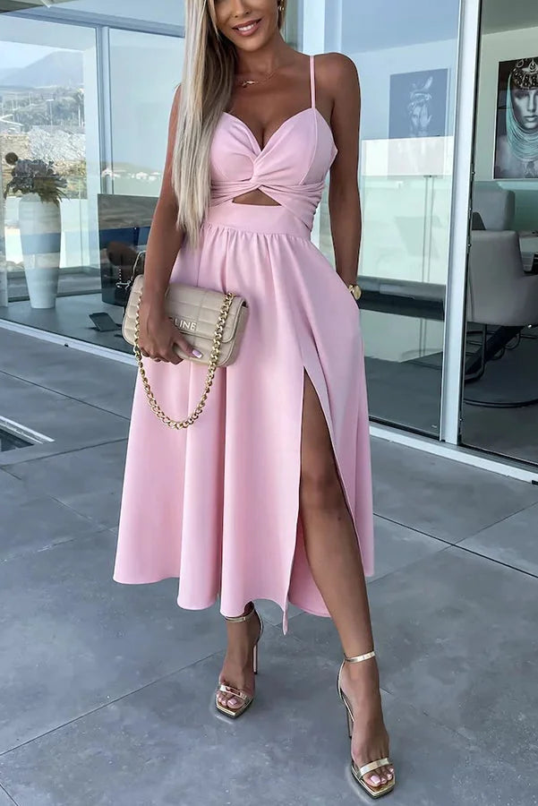 "Black midi dress with cut-out detail & pockets, ideal for casual events. Made from soft fabric, features stylish design."