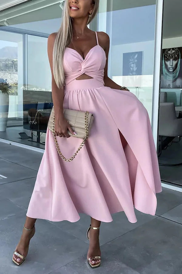 "Siana midi dress with cut-out detail and pockets, made with soft jersey fabric in a stylish design."