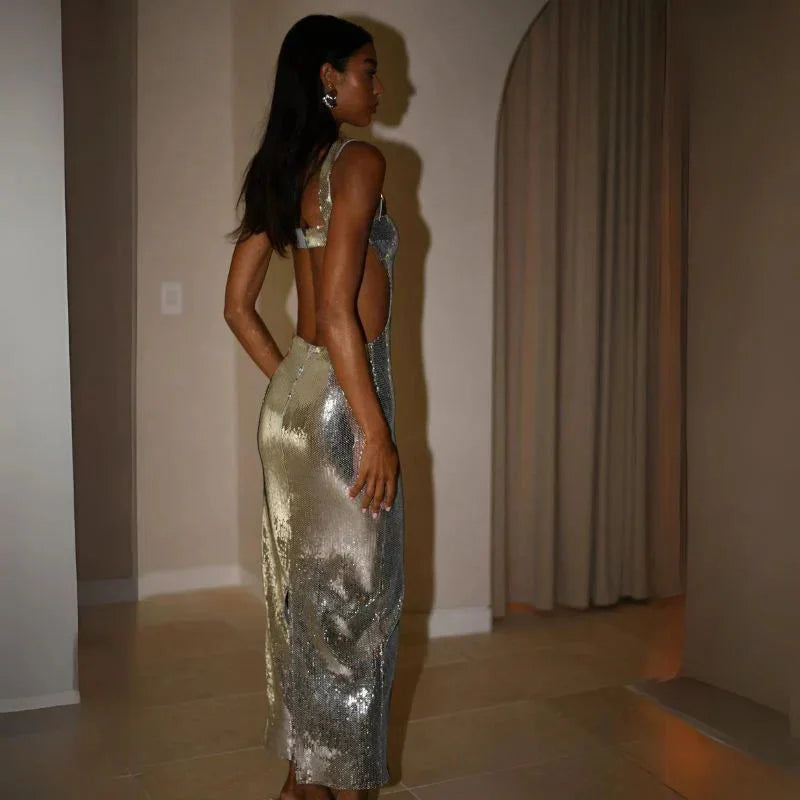 Gorgeous floor-length dress with shimmering sequins in a unique elegant design named Silvana.