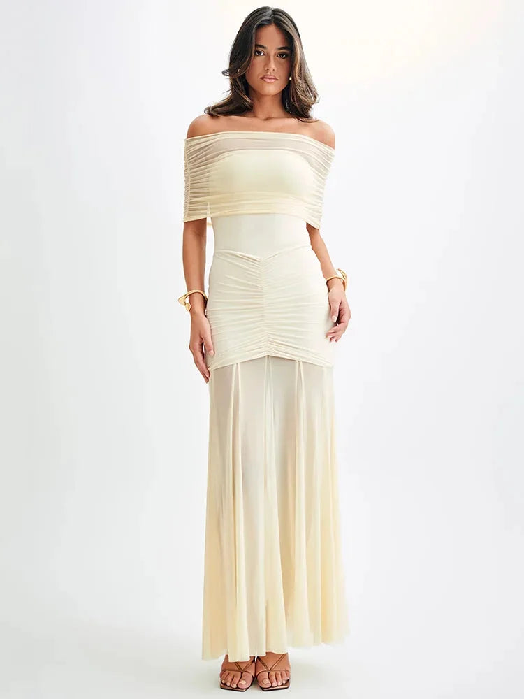Off-shoulder maxi dress in Sonora, featuring ruched bodice. Made with soft flowing fabric in a vibrant design perfect for…