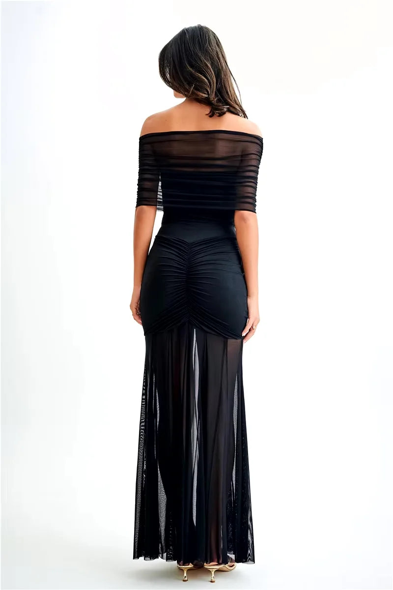 Off-shoulder maxi dress in Sonora, featuring a ruched bodice and floor-length hem. Crafted from soft and stretchy fabric for…