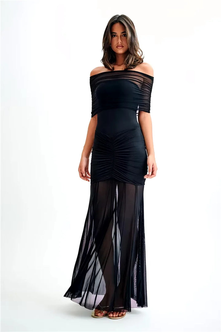 Black off-shoulder maxi dress with ruched bodice, made from a soft and stretchy fabric for a form-flattering fit.