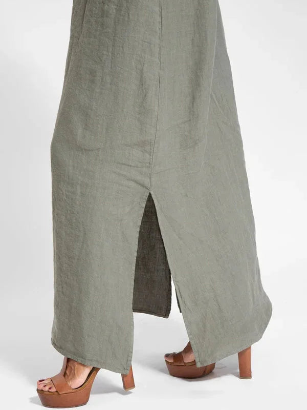 "Sleeveless maxi dress in flowing silhouette, ideal for casual outings. Features lightweight and breathable material in a…
