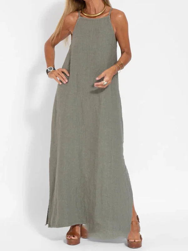 "Susan sleeveless maxi dress in flowing silhouette, made of lightweight and airy fabric, perfect for casual or formal…
