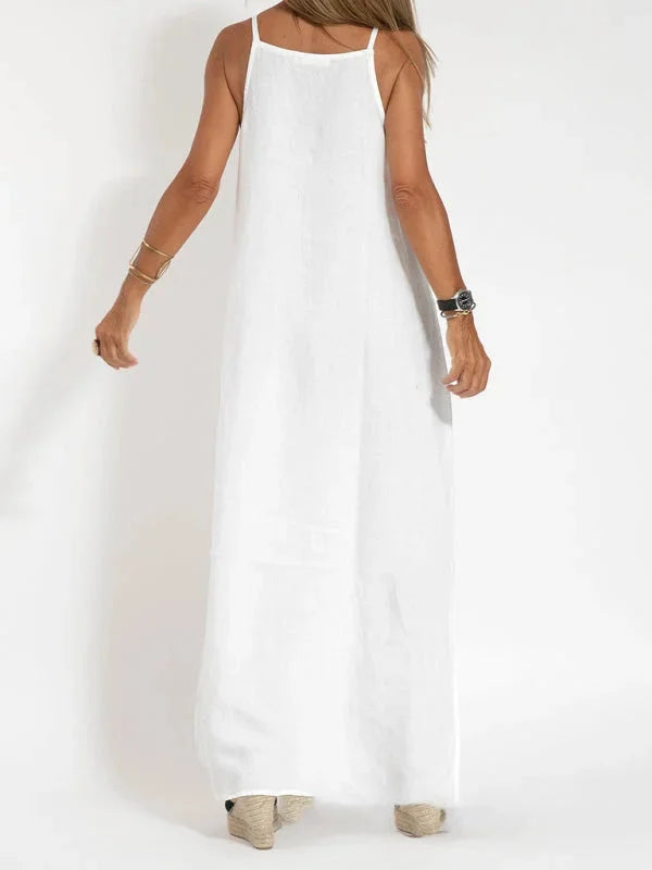 "Sleeveless maxi dress with flowing silhouette in soft cotton blend fabric, perfect for casual or formal occasions."