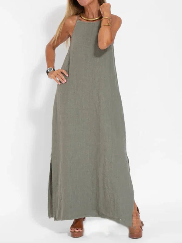 "Susan Olive Green Sleeveless Maxi Dress showcasing a flowy silhouette, perfect for an elegant and comfortable look."