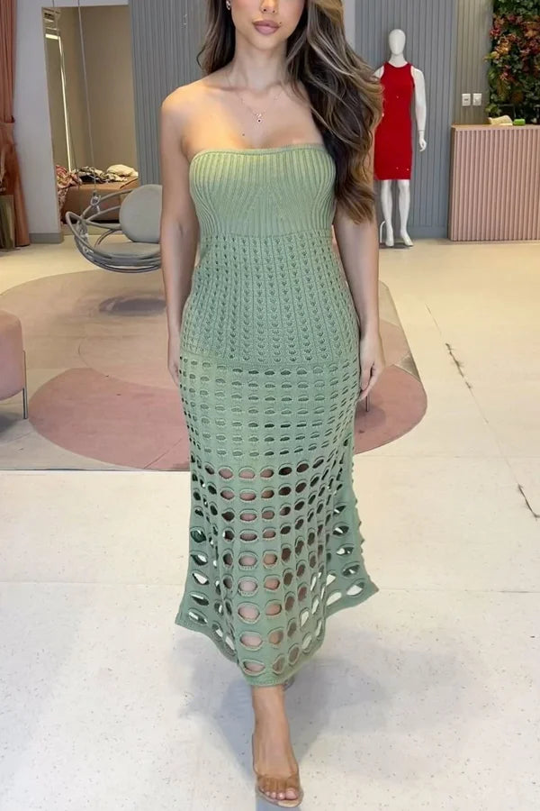 Green off-shoulder maxi dress made of open knit fabric, perfect for casual chic summer days.