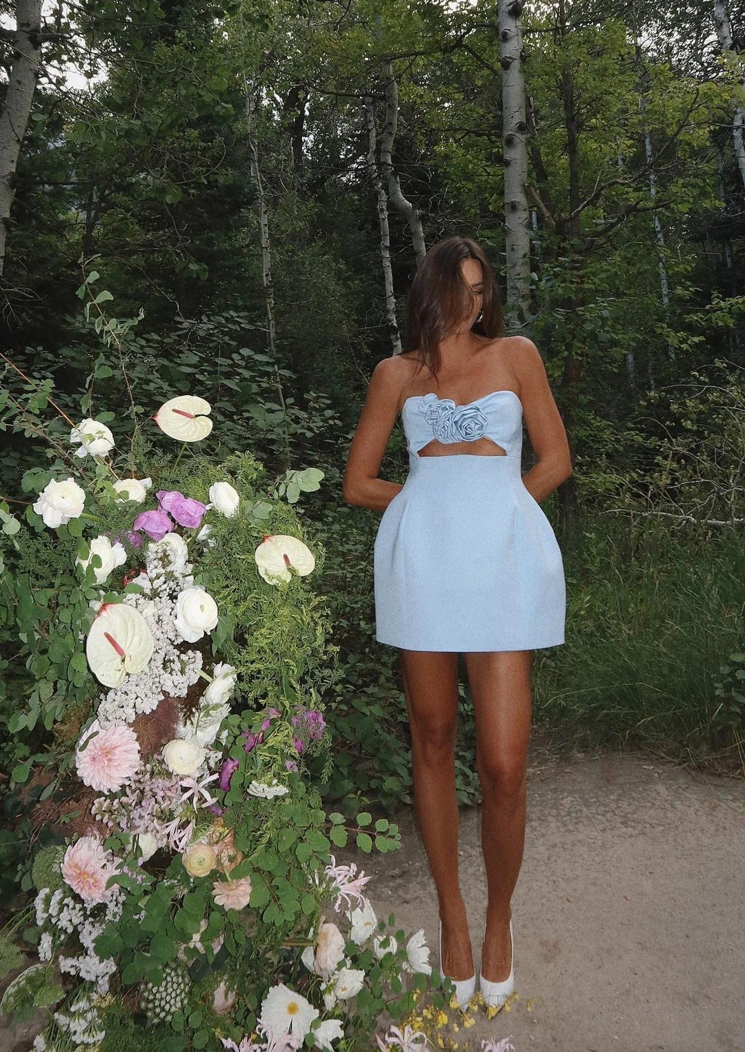Floral mini dress with cutout detail in soft cotton-blend fabric, perfect for sunny days and casual outings.