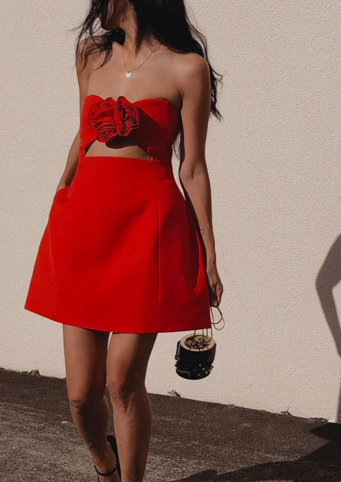 Red mini dress with floral print, featuring cutout detail. Made from lightweight and breathable fabric, perfect for summer…