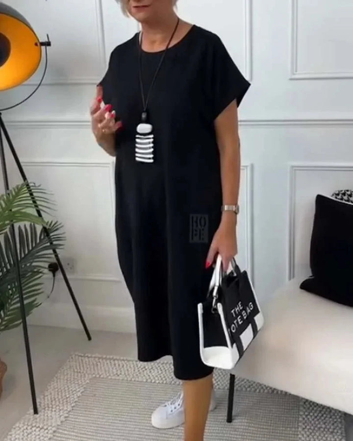 Alt text: "Taya dress made from soft jersey fabric in a figure-flattering silhouette, ideal for all-day comfort and…