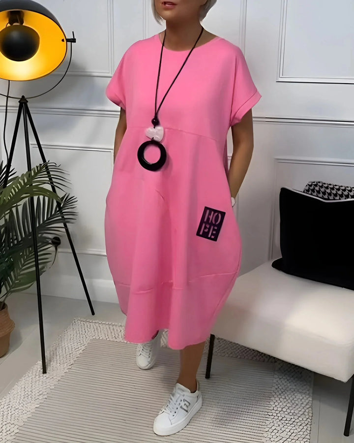Pink dress with a stylish, comfortable fit by Taya. Features a soft, breathable fabric with a flattering design.