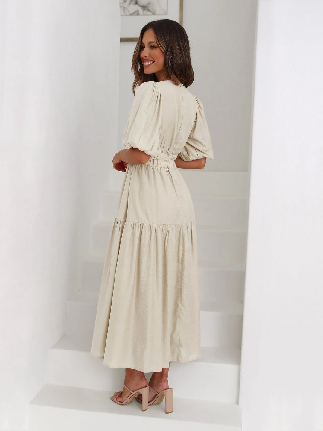 "Black V-neck midi dress with elastic waist, made from soft, stretchy fabric - ideal for casual chic style and all-day…