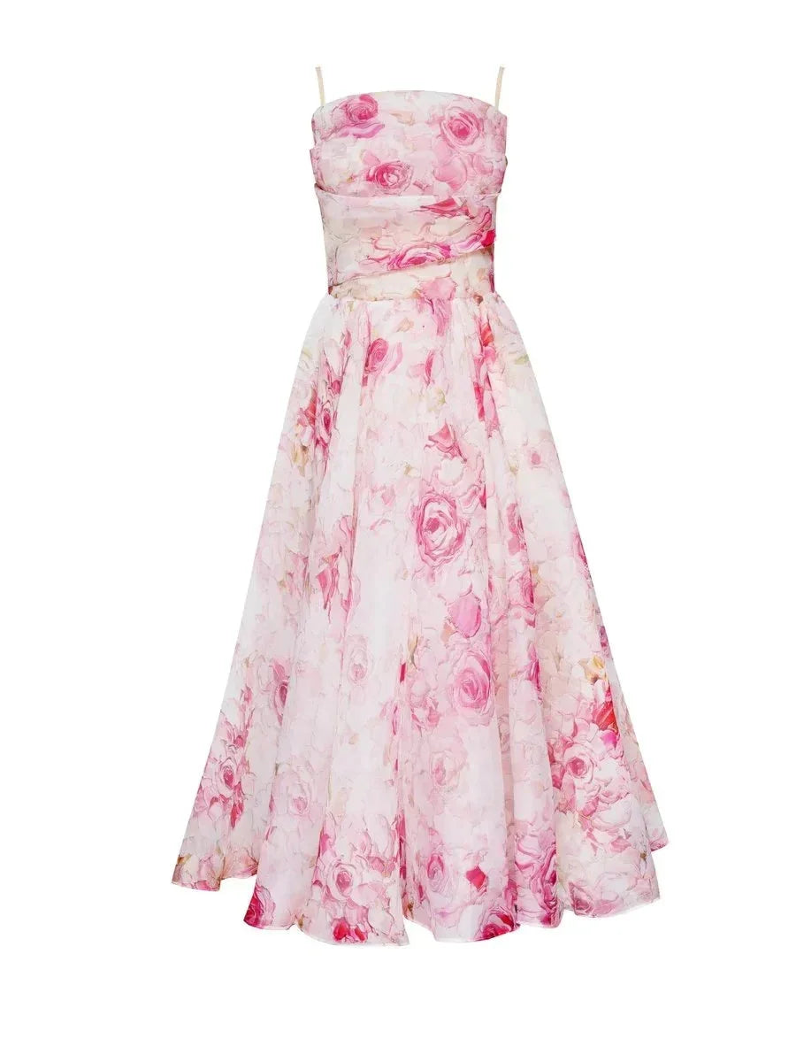 Strapless midi dress with floral print, featuring a soft and breathable fabric ideal for warmer weather and a flattering…