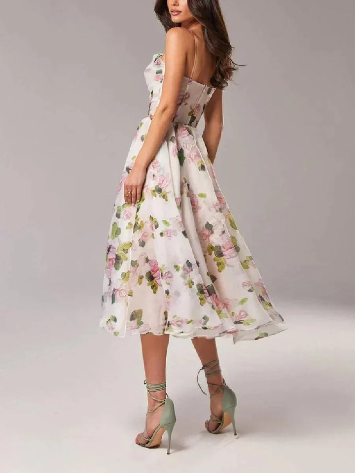 Strapless midi dress in floral print with a lightweight flowy fabric perfect for a summer day out.