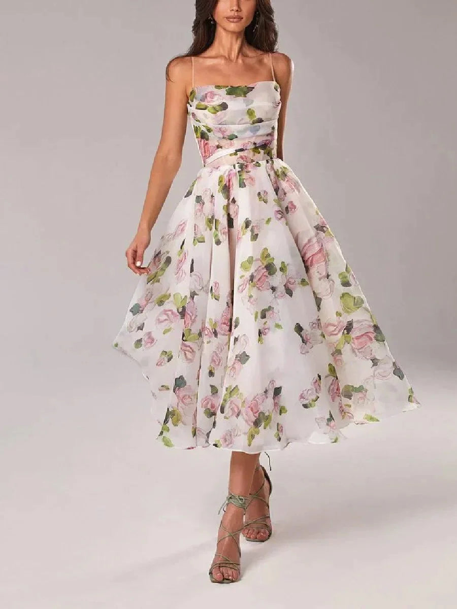 Strapless midi floral dress with a stylish print perfect for summer events, made from soft and breathable fabric.