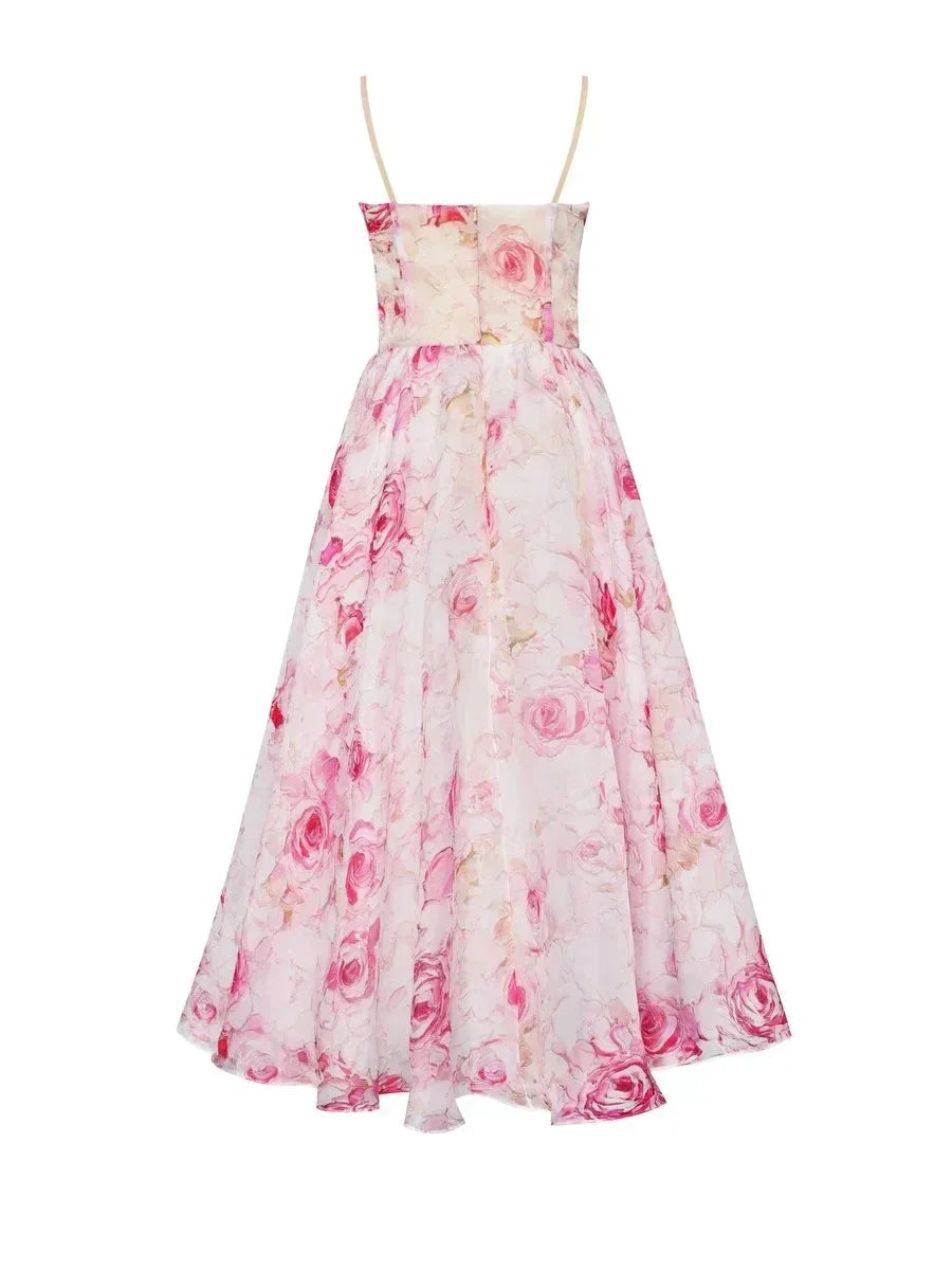 Strapless pink midi dress with floral print, perfect for sunny days. Made from lightweight, breathable fabric for all-day…