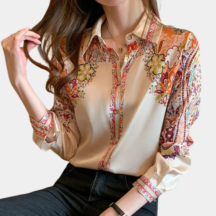 "Tenzin multicolor floral blouse with a versatile design, perfect for any occasion. Made of soft, breathable fabric."