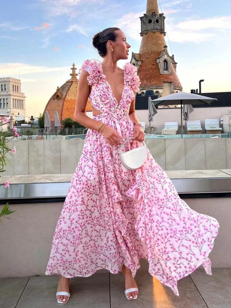 Light Pink wrap dress with elegant ruffle details, made from silky fabric. A chic and feminine attire for any occasion.
