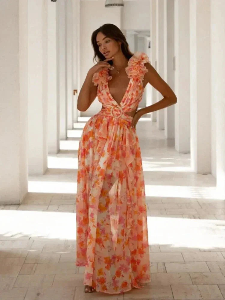 Orange wrap dress with ruffle details. Made of soft, flowy fabric, featuring a flattering wrap design. Perfect for special…