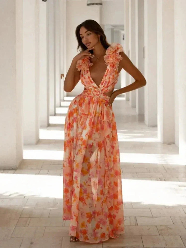 Orange wrap dress with ruffle details. Made of soft, flowy fabric, featuring a flattering wrap design. Perfect for special…