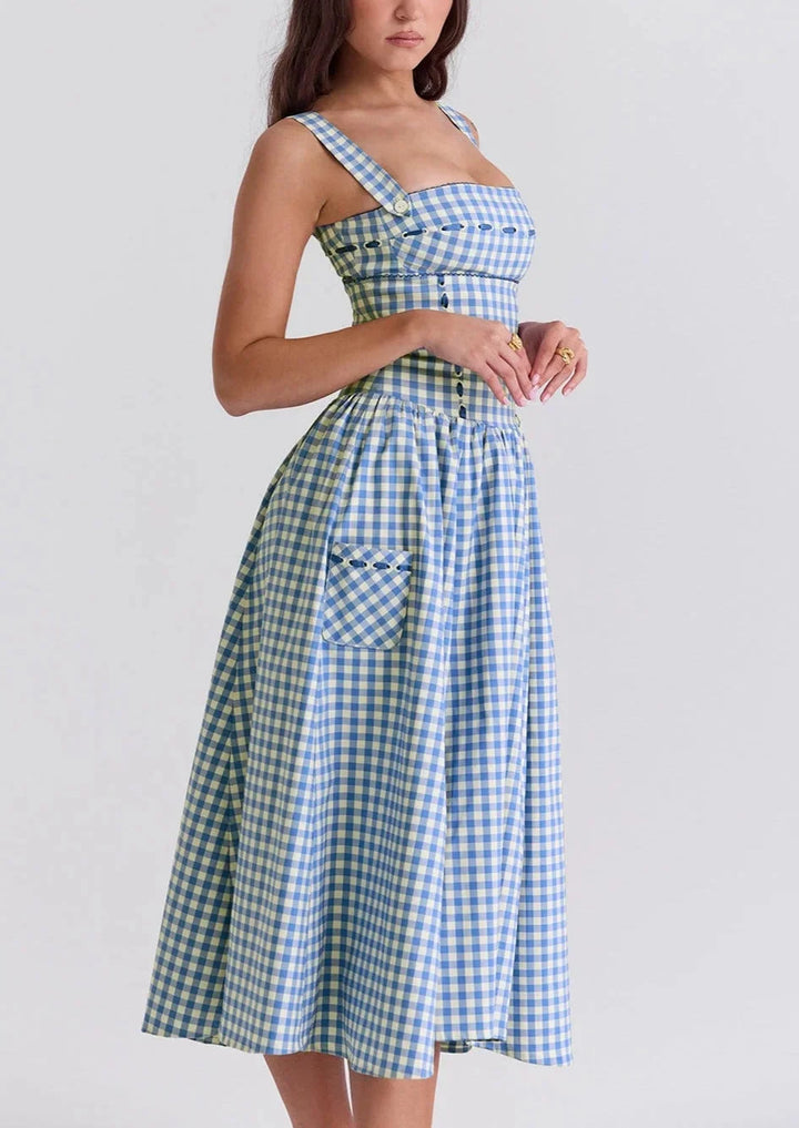 Women's off-shoulder midi dress in summery blue color, featuring a stylish and elegant design perfect for warm weather…