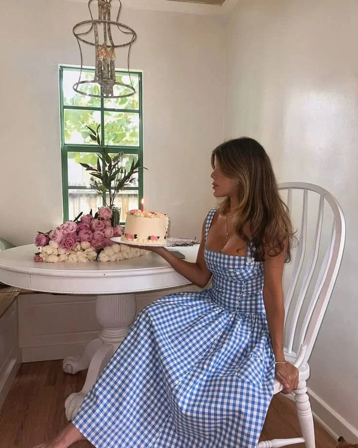 Tierney off-shoulder midi dress in summery blue for women, made from lightweight breathable fabric with a relaxed fit and…