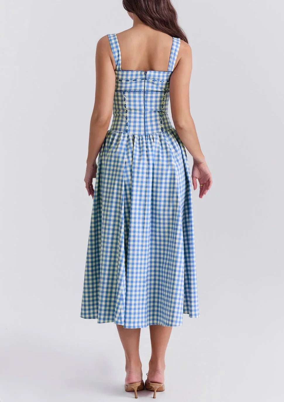 Off-shoulder midi dress in summery blue, tiered design with elegant floral pattern, perfect for warm weather.