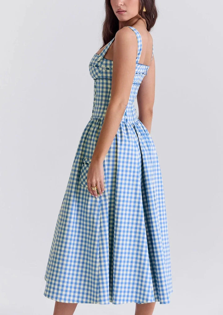 Off-shoulder midi dress in summery blue for women, featuring a flowing design perfect for warm weather days.