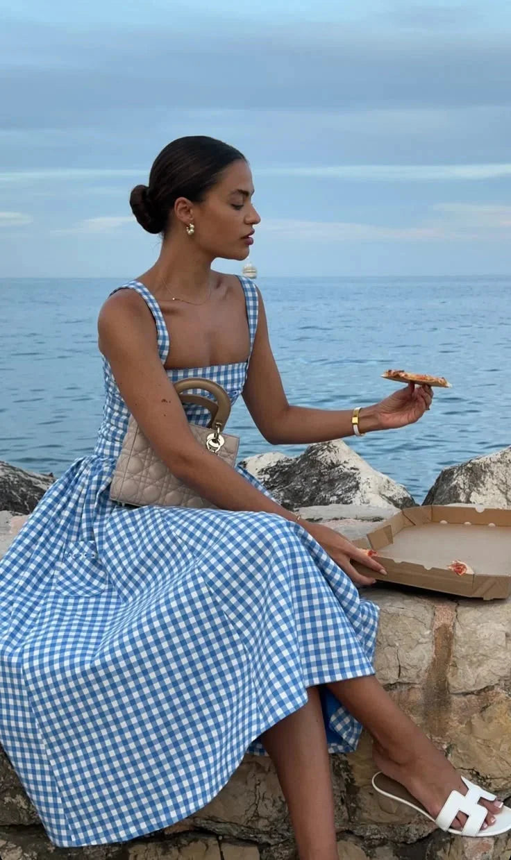 Off-shoulder midi dress in summery blue with a relaxed fit. Perfect for casual outings.