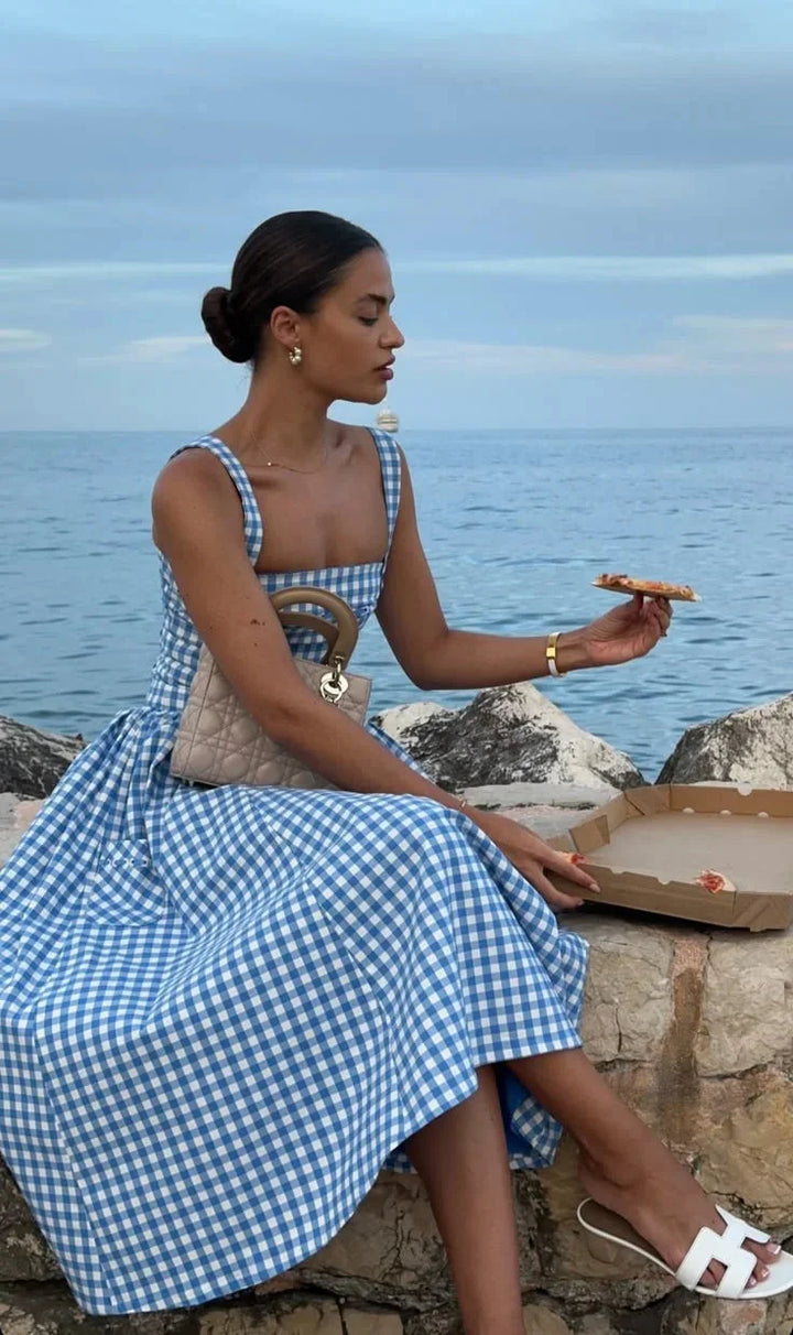 Off-shoulder midi dress in summery blue with a relaxed fit. Perfect for casual outings.
