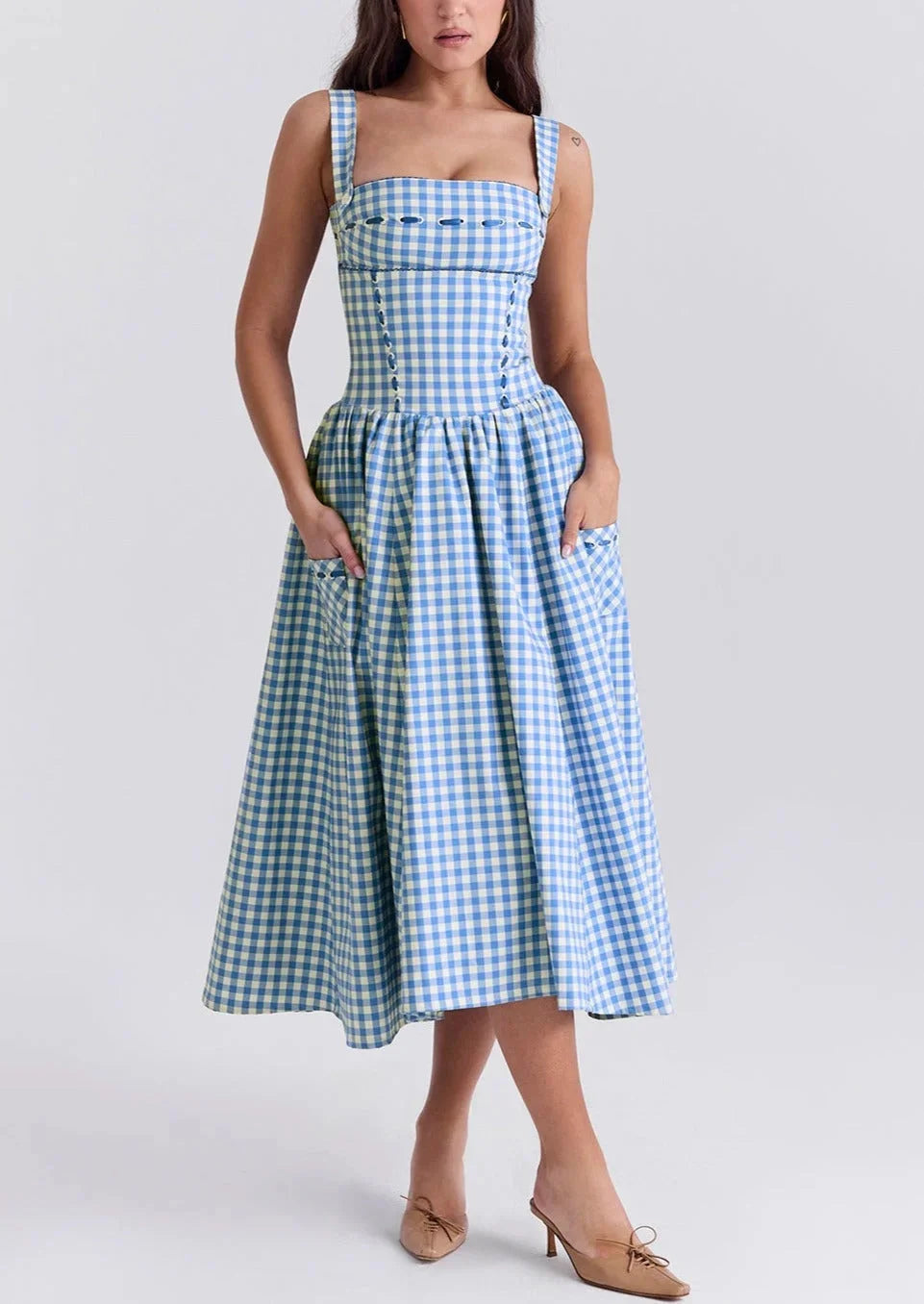 Blue off-shoulder midi dress for women, perfect for summer days. Features a refreshing and chic design with a cool…