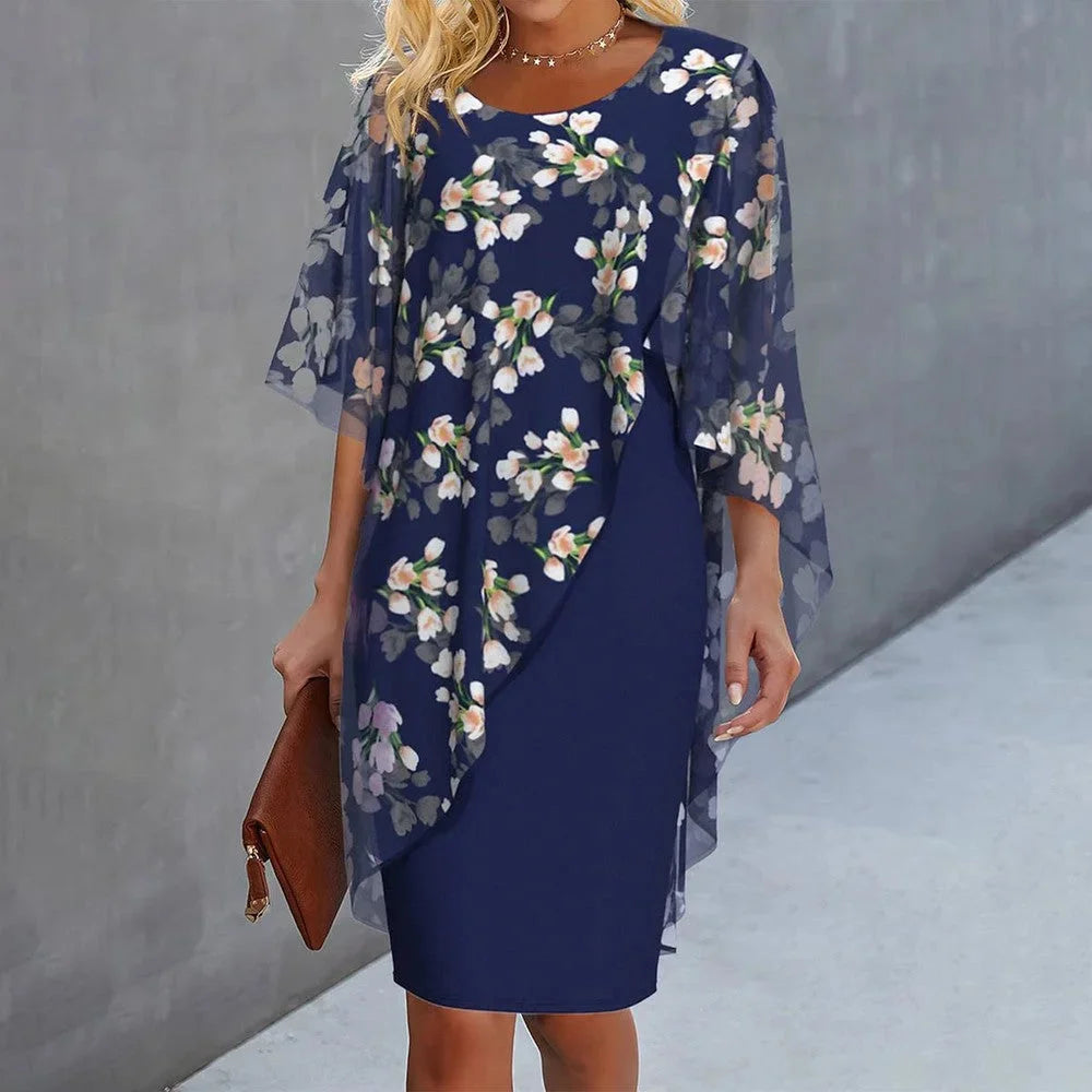 Sheer floral overlay shift dress in Tully, highlighting delicate floral pattern and airy sheer fabric perfect for a casual…