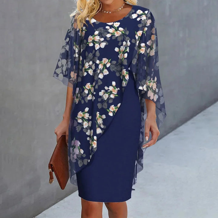 Sheer floral overlay shift dress in Tully, highlighting delicate floral pattern and airy sheer fabric perfect for a casual…