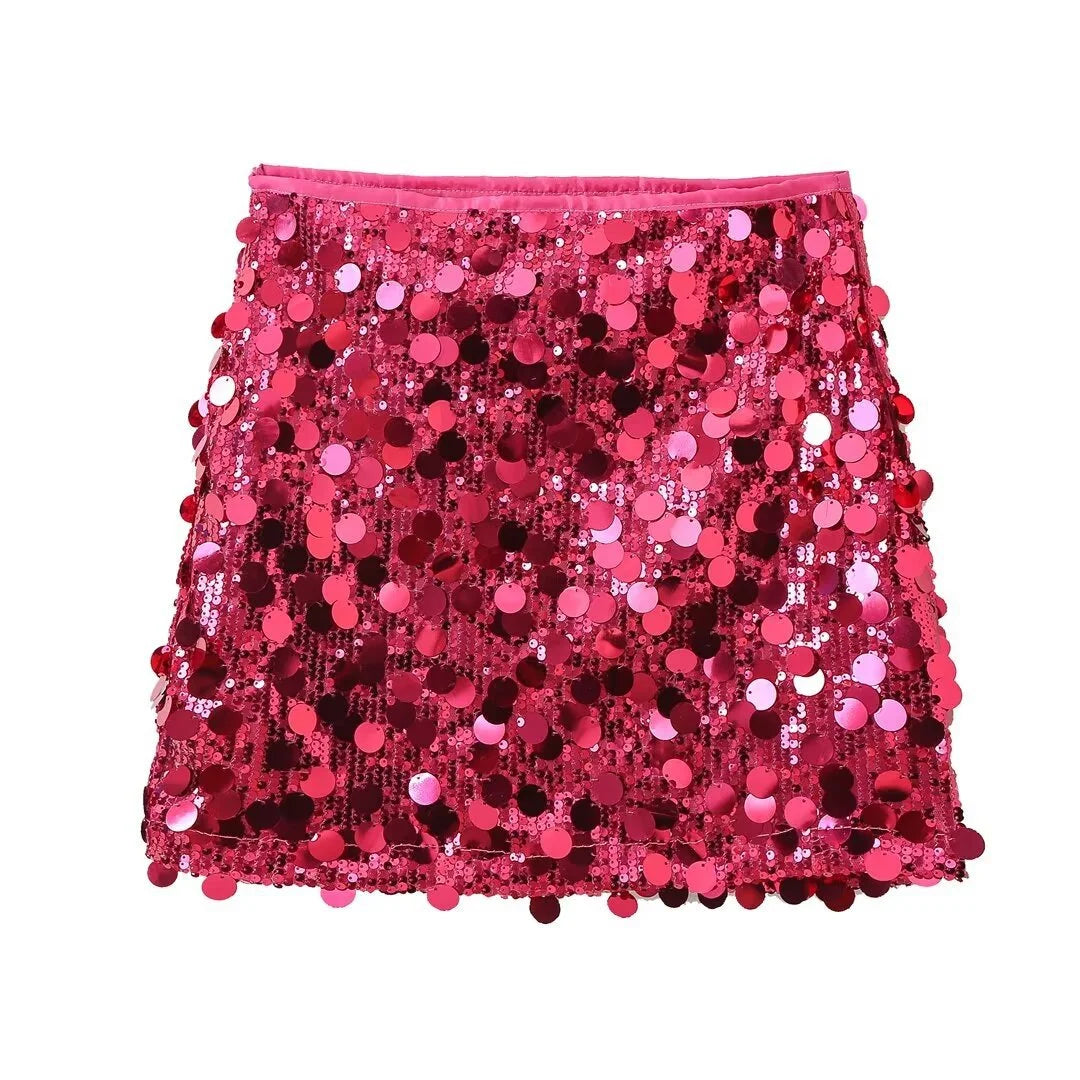 Pink sequin mini skirt featuring sleek fit, perfect for making a statement.